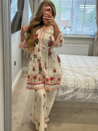 Noor Kamal White x