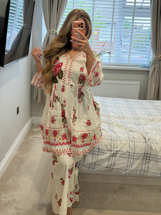 Noor Kamal White x