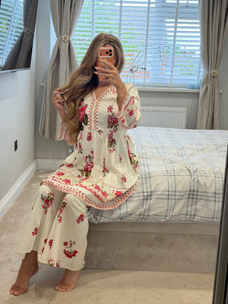 Noor Kamal White x